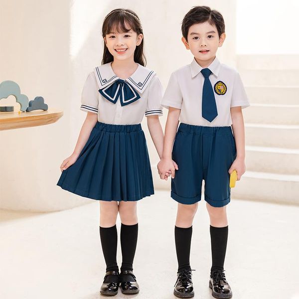 Roupas conjuntos de roupas Kid Kid coreana uniforme escolar japonês camisa branca camisa azul shorts plissados ​​gravata de saia para meninos roupas de roupas definidas