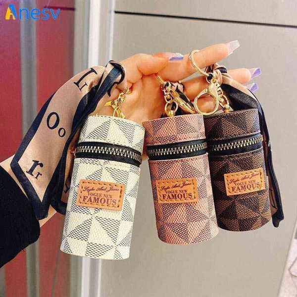 

1pc luxury leather bucket lipstick bag keychain for women personality storage bag pendant accessory car keyring girls trinket gifts y220725, Silver