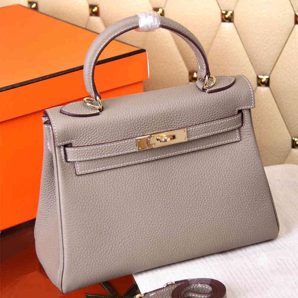 

kelyss new lychee head leather bag in spring and summer of have logo