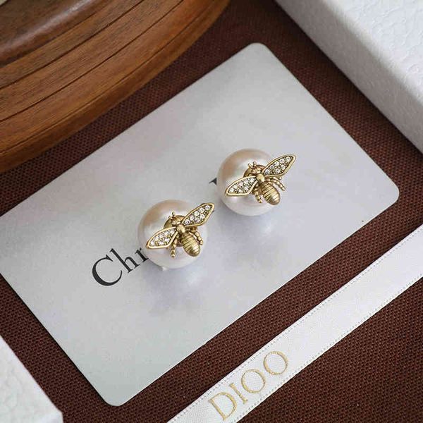 

2022 factory wholesale new earrings female style brass dijia net red pearl versatile earrings, Golden