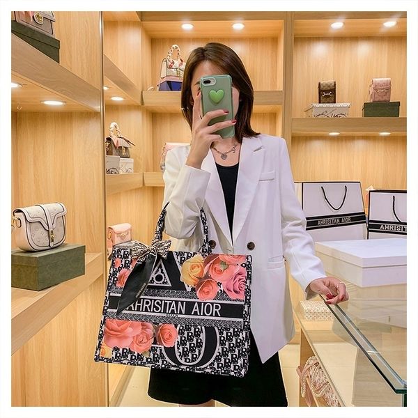 

38% off new large women's fashion net red simple hand shopping bag trend embroidered tote bag