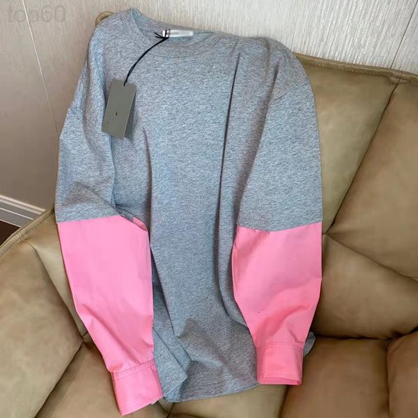 

designer 2022 spring new long sleeved t-shirt fake two-piece splicing contrast color fashion playful european goods 2002 luxury, White