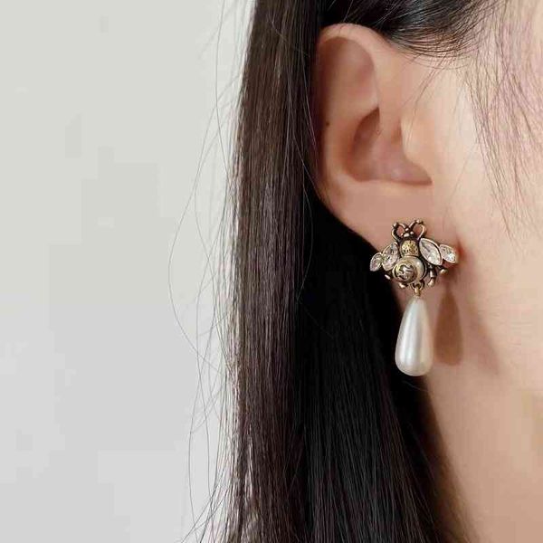 

2023 designer new jewelry fashion pearl female ancient home earrings, Golden