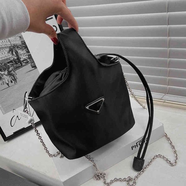 

bag female new nylon waterproof handbag triangle standard drawstring vegetable basket handbag mahjong bag