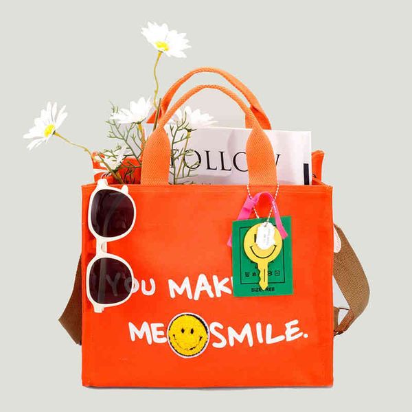 

casual canvas tote bag designer letters women handbags smiling face shoulder crossbody bags small shopper purses summer sac 220427