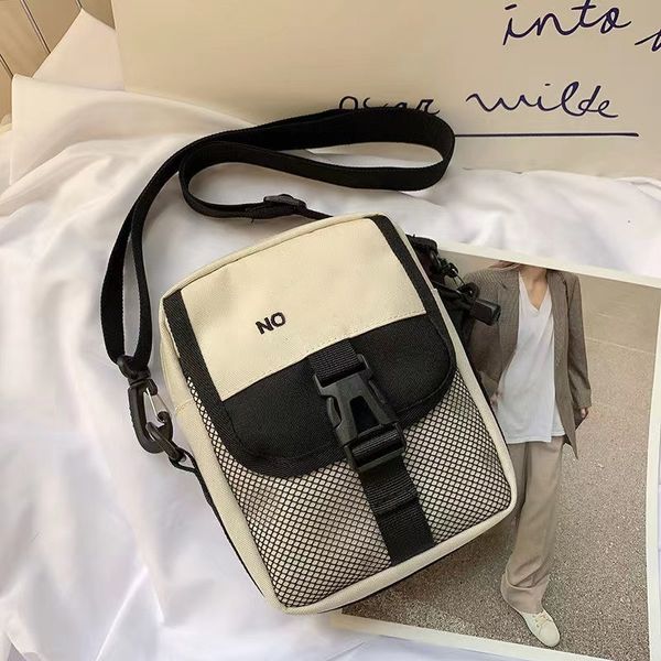 

2022 trendy waterproof diagonal bag student leisure one shoulder designer bag couple outdoor sports travel mobile bags