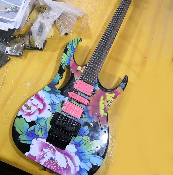 

6 strings black electric guitar with flower pattern rosewood fretboard