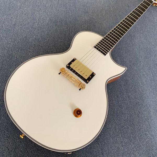 

electric guitar, ebony fingerboard, gold hardware, mahogany body