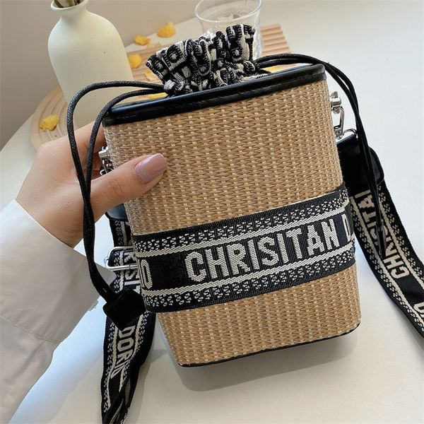 

factory online sales summer straw female 2022 new beach holiday bucket bag letter french woven one shoulder messenger bag
