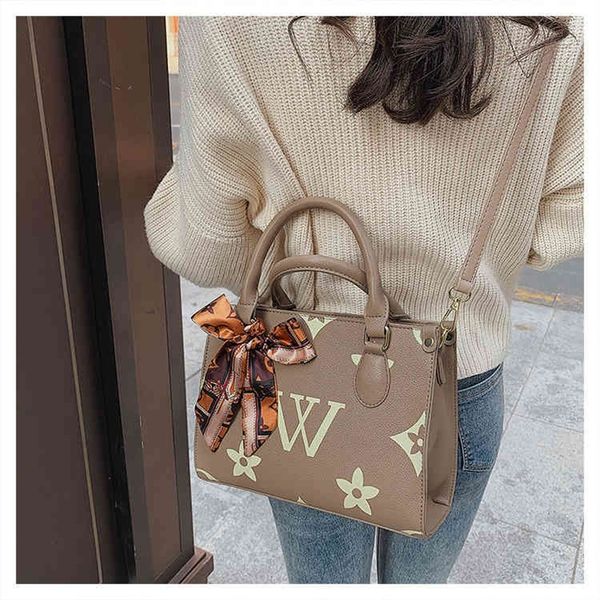 

75% off outlet store women's bag new 2022 foreign style messenger shoulder bag large capacity portable fashion handbag
