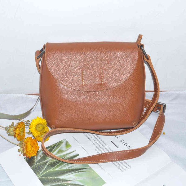 

designers bags leather women's bag leisure headdress layer leather saddle versatile one shoulder diagonal half round straight hair