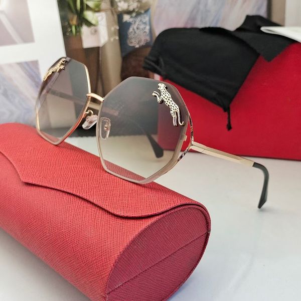 Designer de carrinho de moda Cool óculos de sol Retro Carti Hexagon Acessório espelho embutido leopardo ouro polido de metal moldura UV400 SUN SOBES SUN SOBES CAMPOMAGNE