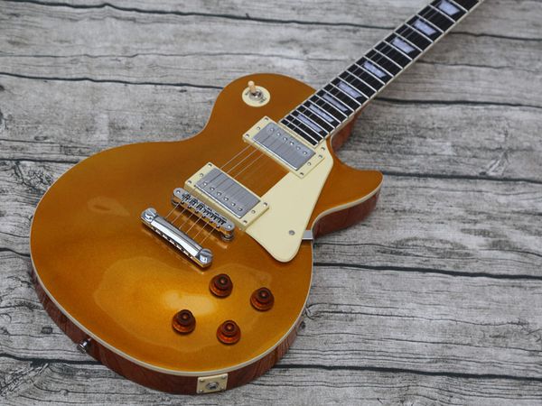 

quality gold 57 electric guitar, bone nut, small pin bridge