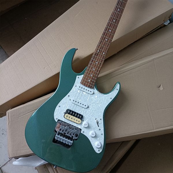 

6 string metalli green electric guitar white pearled pickguard