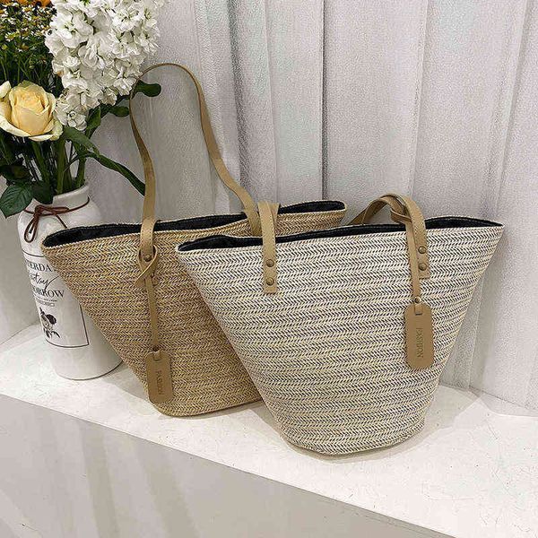 

straw bag female new fashion holiday woven french minority portable single shoulder vegetable basket bag versatile bucket bag220614