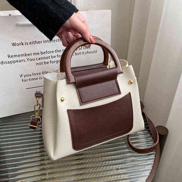 

vintage 2022 contrast handbag large capacity child mother single shoulder messenger bag foreign style bucket bag women's bag g220517