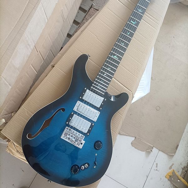 

6 strings semi-hollow blue electric guitar with rosewood fretboard abalone inlay