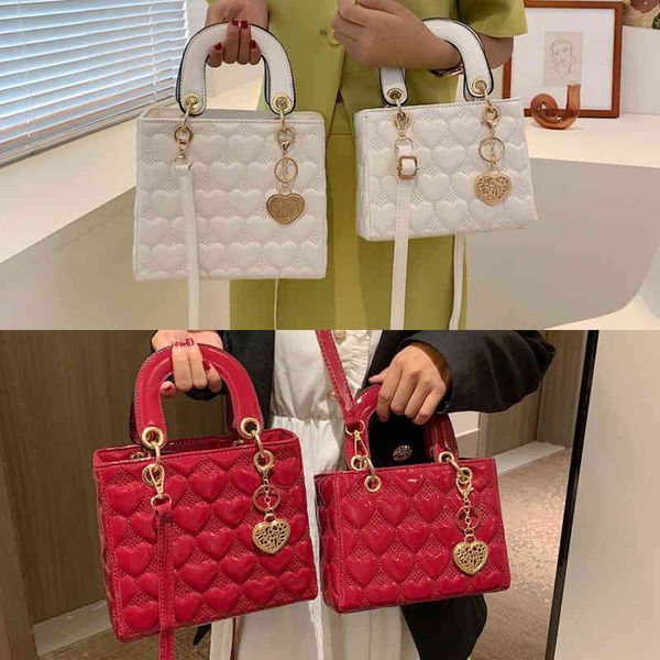 

female new fashion diagonal cross embroidered stylebag versatile high-grade texture one shoulder small square bag