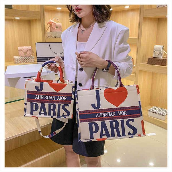 

2022 new designer handbags tote canvas women's foreign style autumn and winter new fashion 100 large capacity portable shoulder