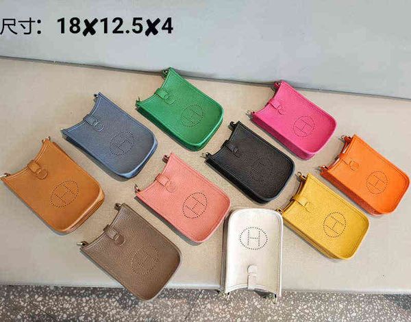 

fashion cowhide women's zero wallet versatile vertical mini bag mobile phone female menger