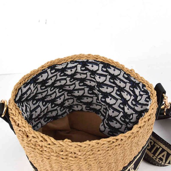 

factory direct sale sales of cylinder crossbar large capacity straw woven designer bag