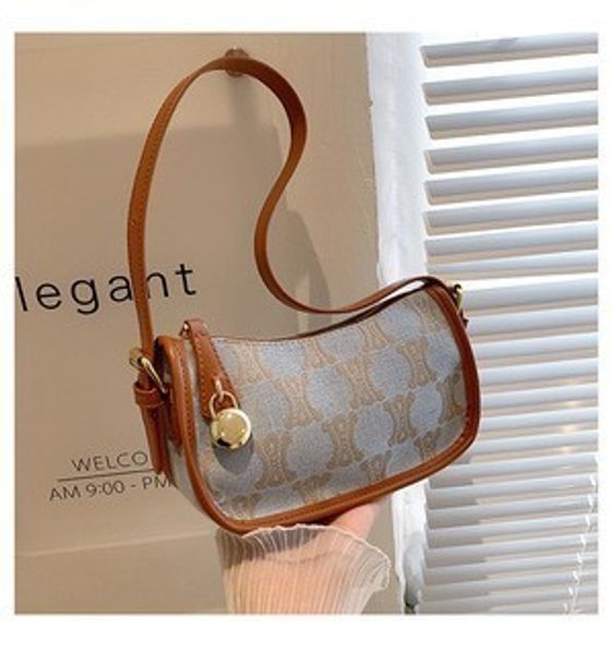 

factory online export designer brand bag handbag and triumphal armpit female 2022 new fashion single shoulder diagonal cross portable canvas