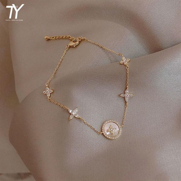 

new bracelet mode micro zirkoon korean women's jewelry classic alloy plum blossom cross shape bracelet3150, Golden;silver