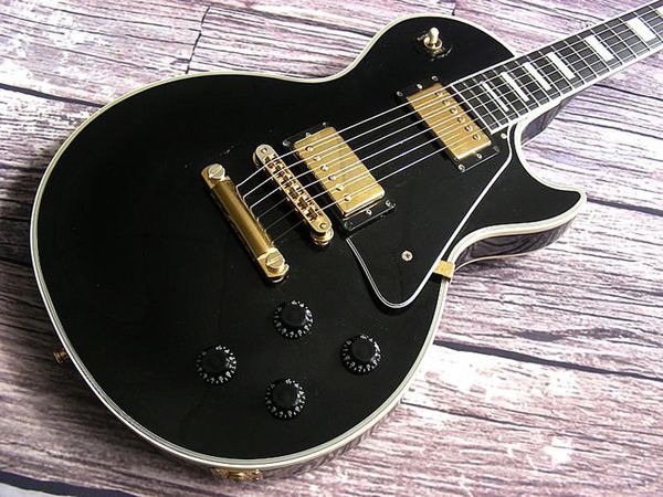 

custom quality electric guitar, mother of pearl inlay,bone nut, small pin bridge