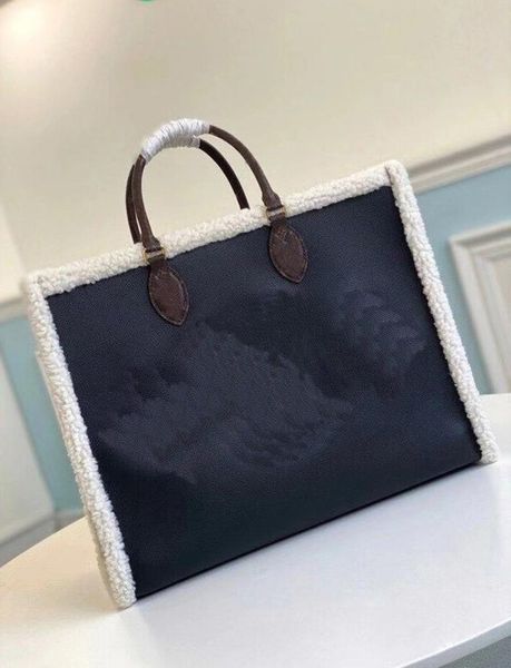 

m56958 womens grained black leather flowers motif shearling inserts handles shoulder straps shopping bags