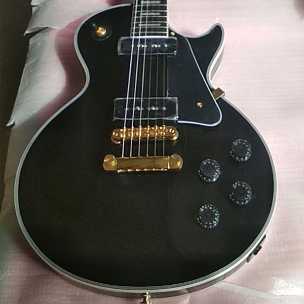 

customized p90 black gloss electric guitar with ebony fretboard and fret binding