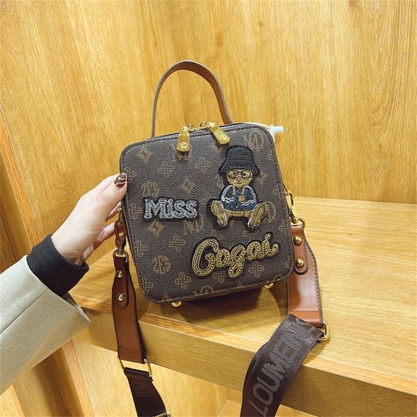 

luxury designer messenger bag handbag girl bear perfume