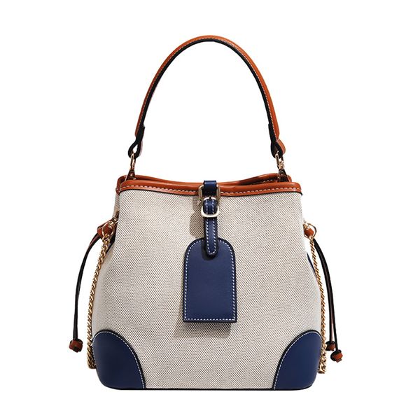 

2022 canvas casual lady's bag with two-tone design fashion baby girl's shopping handbag bucket with metallic chains that can hold