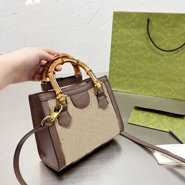 

luxury designer messenger bag leather splicing canvas with bamboo handle classic retro large capacity urban handbag