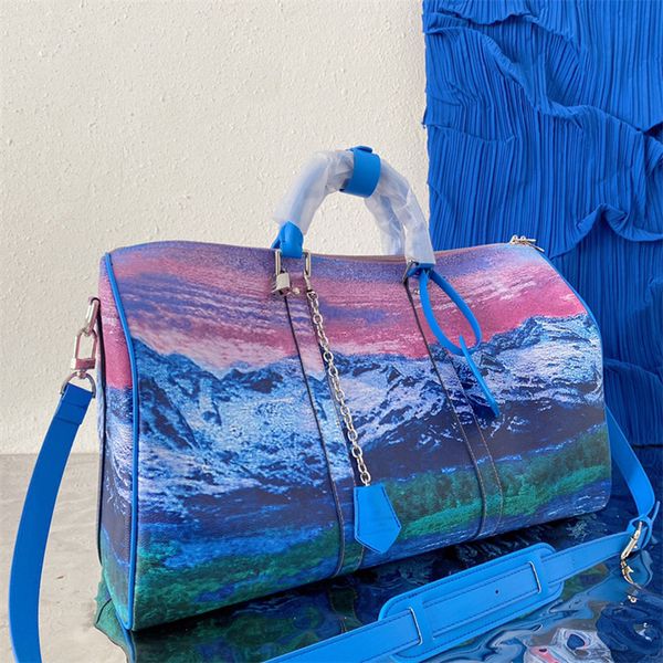 Borse di lusso di design Borsa da 50 cm Keepall Laser Pvc Snow Mountain Modello Borsoni Borsa da viaggio per bagagli a colori brillanti Borsa a mano di grande capacità