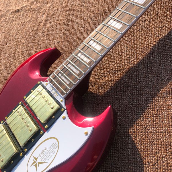

electric guitar,rosewood fingerboard,metal red,chrome hardware