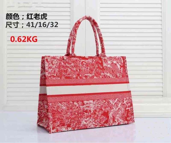 

2022 new designer handbags portable striped pattern double handle capacity shopping