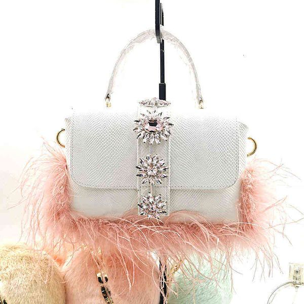 

designers bags 2010 thailand xiaozhongchao brand women's bag fashion portable one shoulder water brick feather diagonal