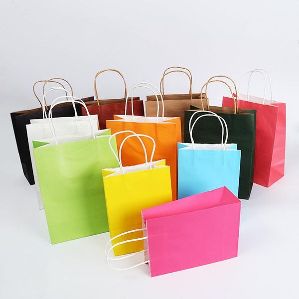 Pedra de papel 10pcs lot color kraft wit with handles festival sacos de compras de alta qualidade 25x33x12cmgift