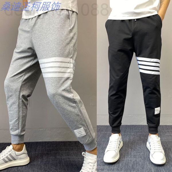 

men's pants designer black pants men's nine point sports fashion brand students' loose leg four bar leisure spring and autumn