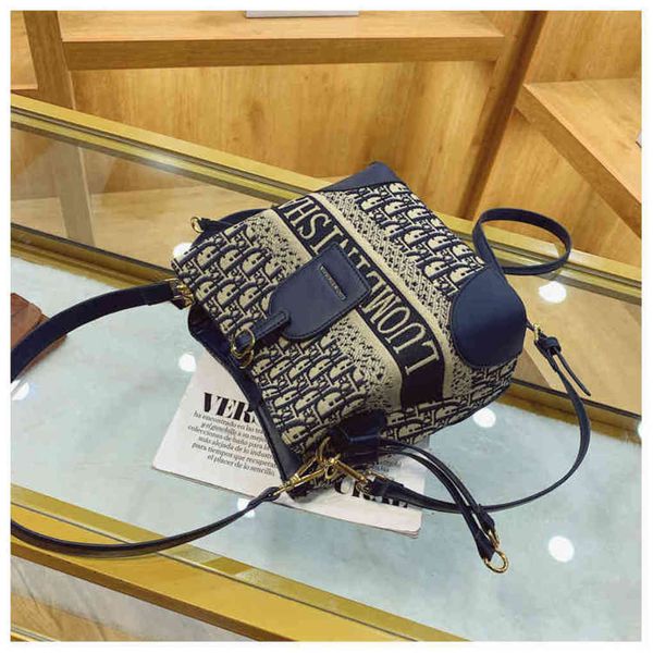 

60% off new designer luxury bags old flower bucket new hand sense single canvas messenger