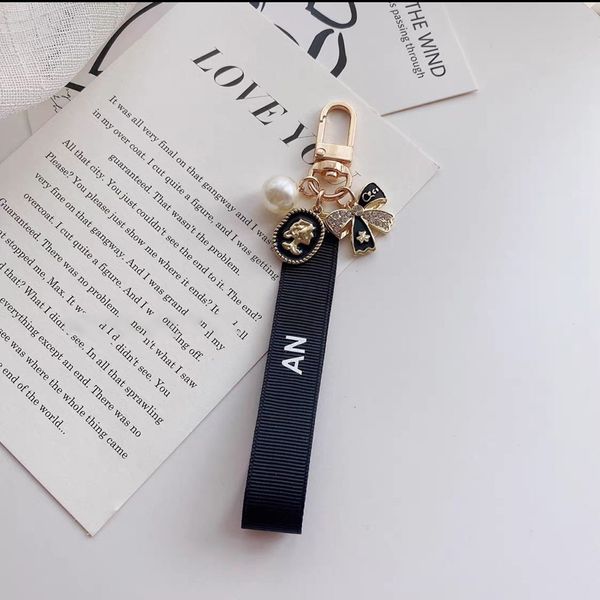 

pearl keychain black ribbon bow key chain pendant car pendant bag pendants, Silver