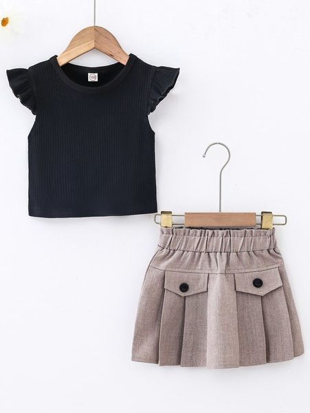 

little girl's ruffled t-shirt and paper bag waist pleated skirt she, White