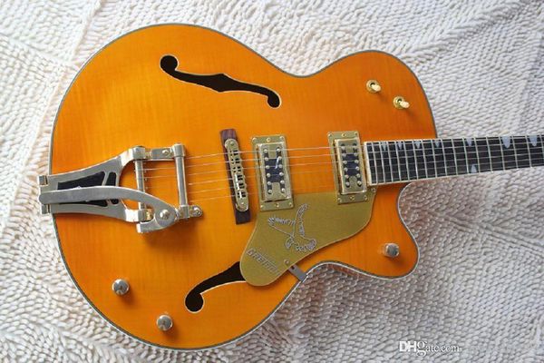

jazz electric guitar with vibrato hollow body guitar amber colour