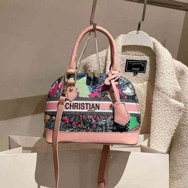 

58% off online clearance 2022 new women's shell hand single shoulder messenger bag color painting graffiti printing foreign trade bags
