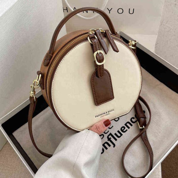 

niche design one-shoulder women's bag 2022 new fashion messenger bag texture high-quality hand-held small round bag x220331