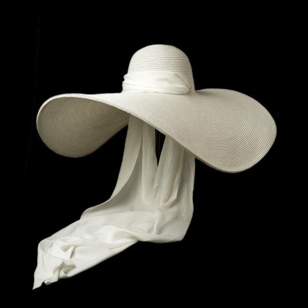 Cappelli a tesa larga Cappello da spiaggia per vacanze da viaggio laterale oversize da donna elegante con nastro lungo in rafia fasciato alla moda