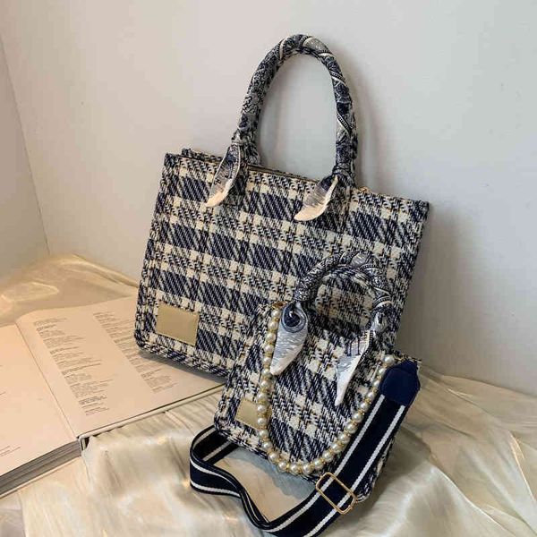 

2022 factory wholesale new net red same pearl travel hand large capacity women's bag minority tote bag