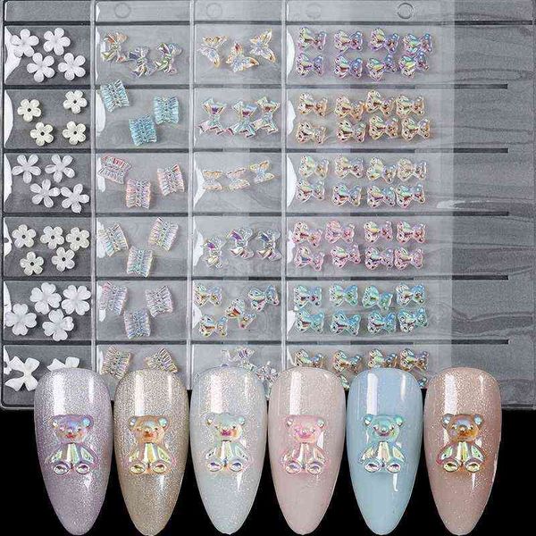 1 Paket 3D Sevimli Aurora Ayı / Yay Bağları / Etek / Beyaz Çiçekler Akrilik Nail Art Süslemeleri Çivi Glitter DIY Manikür Aksesuarları için Y220408