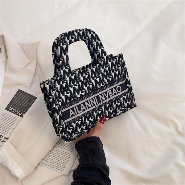 

female fashion net red canvas single underarm versatile large capacity hand tote 50% off shop clearance