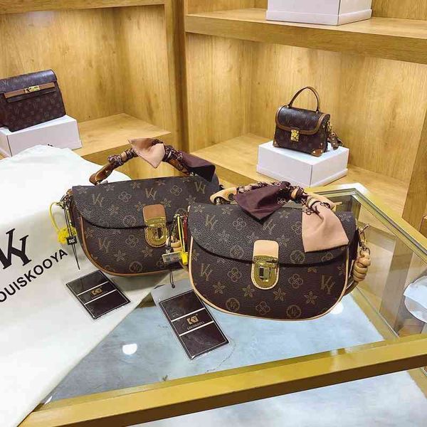 

kuya ky old flower lock women's bag single shoulder menger bag wind commuter fashion